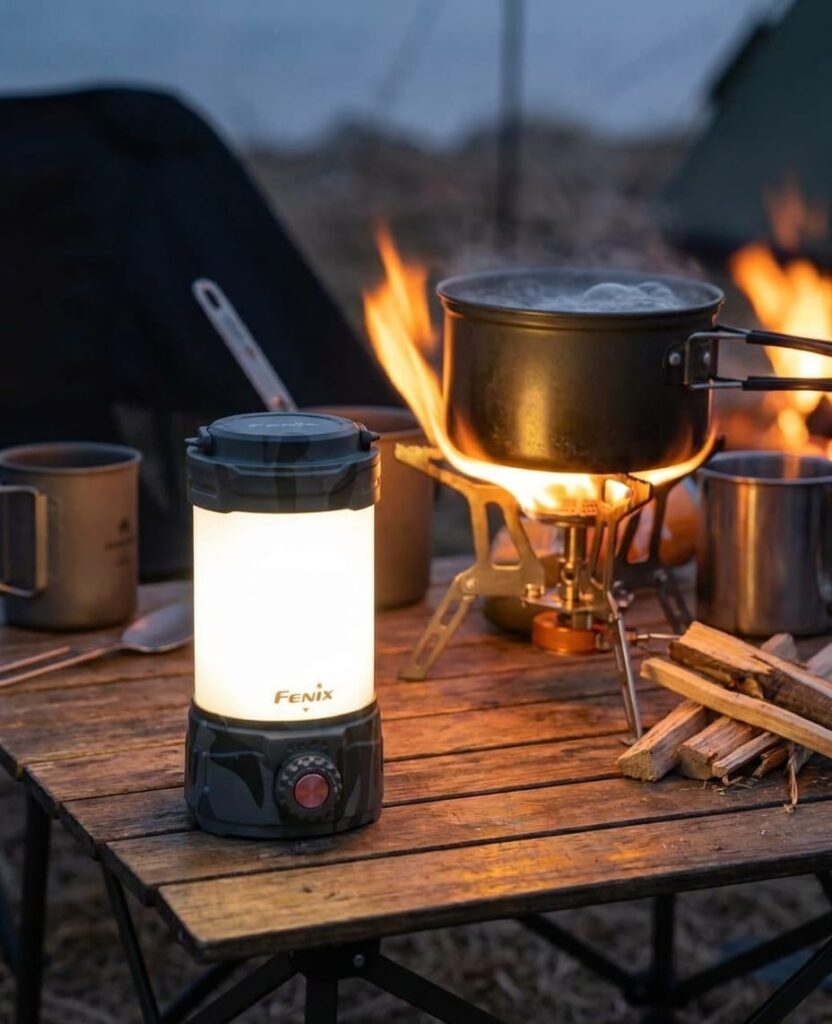 Fenix CL26R Pro Camping Lantern lighting cooking at a camp.